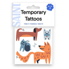 Saint brand temporary tattoo sheets featuring cute pet illustrations including a dachshund, cat, dog, and fox in orange, brown, blue, and gray colors.
