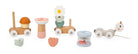 Set of wooden toys with wheels on a white background