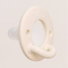 White ceramic hook on a light gray background