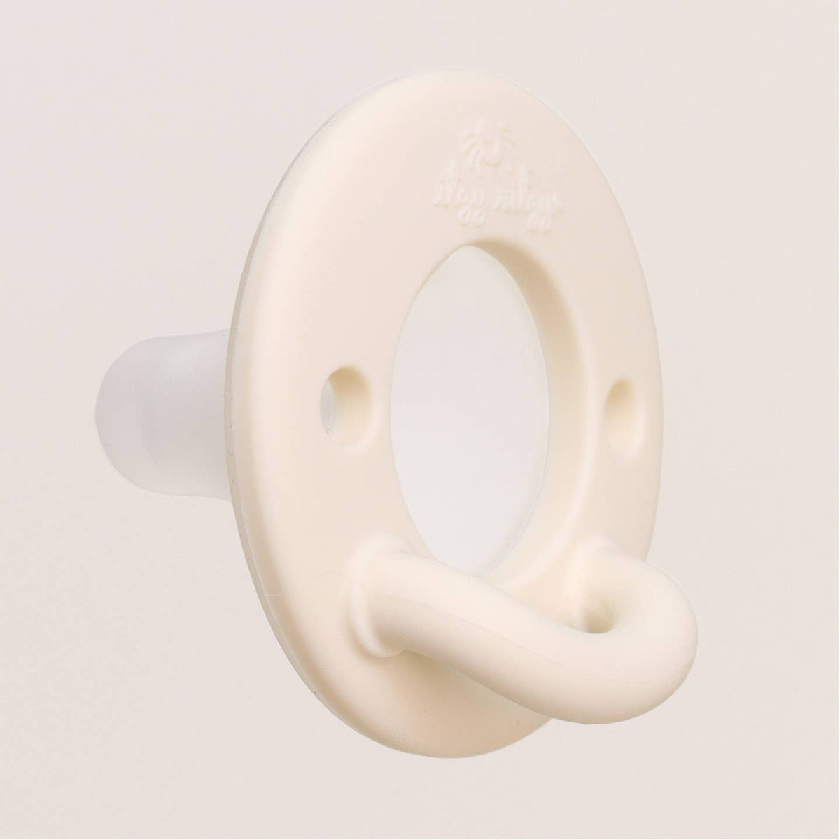 White ceramic hook on a light gray background