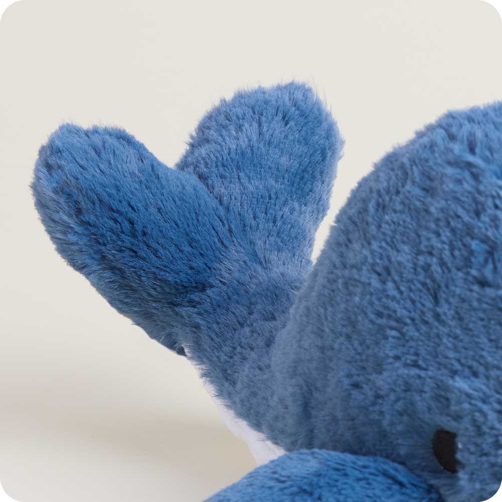Close-up of a blue plush toy on a white background