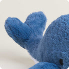 Close-up of a blue plush toy on a white background