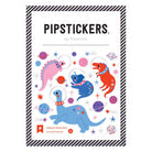 Pipsticks by Pipsticks dinosaur through space sticker sheet, featuring cartoon dinosaurs in a space theme with planets and stars on a white backing card with a black and white striped border.