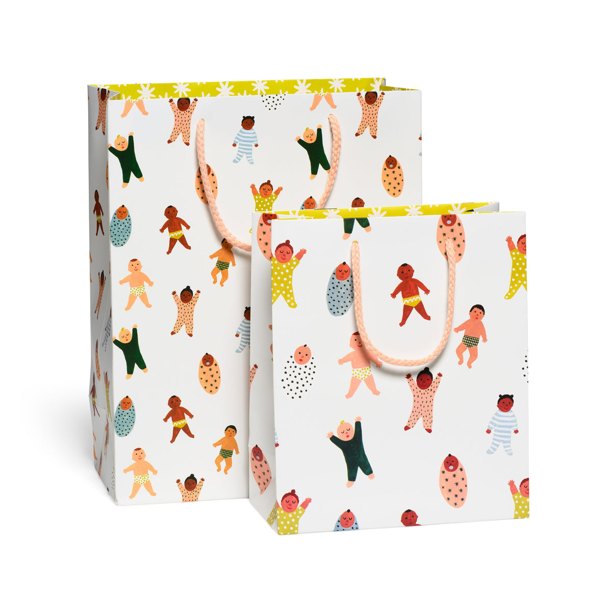 Two colorful gift bags with cartoon character pattern on a white background
