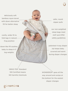 A baby wearing a light gray WonderZip diaper bag wrap with a white belly band, shown with multiple text callouts explaining product features on a light beige background.