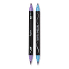 Two Tattoo Flair double-ended tattoo markers placed vertically side by side against a white background, featuring black barrels printed with "Tattoo Flair" and "Snifty" text alongside fine-tip and brush-tip icons. Each marker is capped with a different metallic shade at both ends, showing a light purple cap on the left and a bright blue cap on the right.
