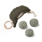 Dog toy set with a plush dog-shaped toy and three ball toys on a white background