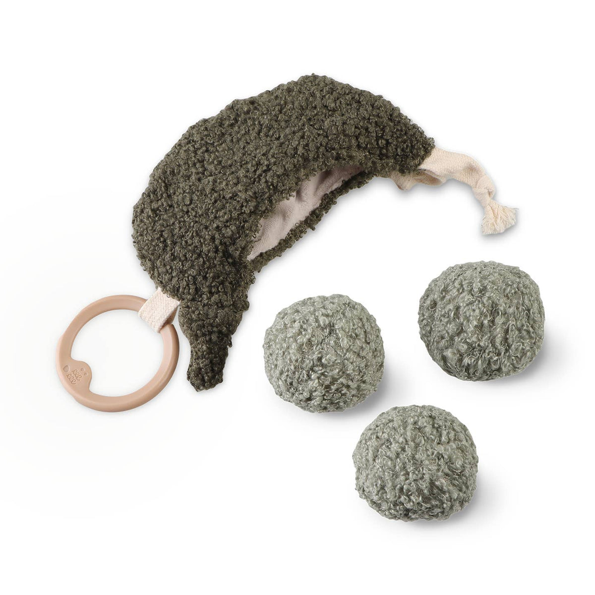 Dog toy set with a plush dog-shaped toy and three ball toys on a white background