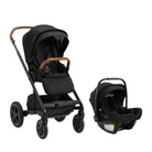 A black stroller and matching infant car seat travel system shown on a clean white background. The stroller has a black seat and canopy with brown wooden handle accents, and the car seat is also black with a brown handle.