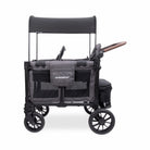 Black and gray stroller wagon with canopy on a white background