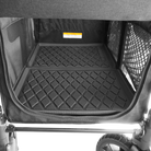 Black diamond-patterned liner inside a pet carrier