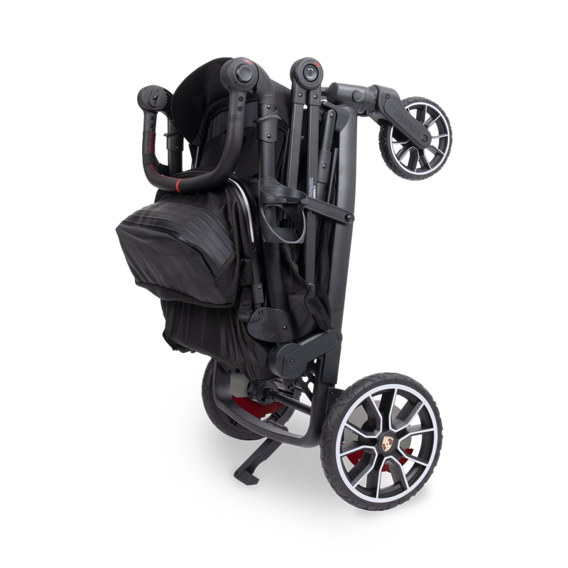 Black stroller with Porsche design elements on a white background