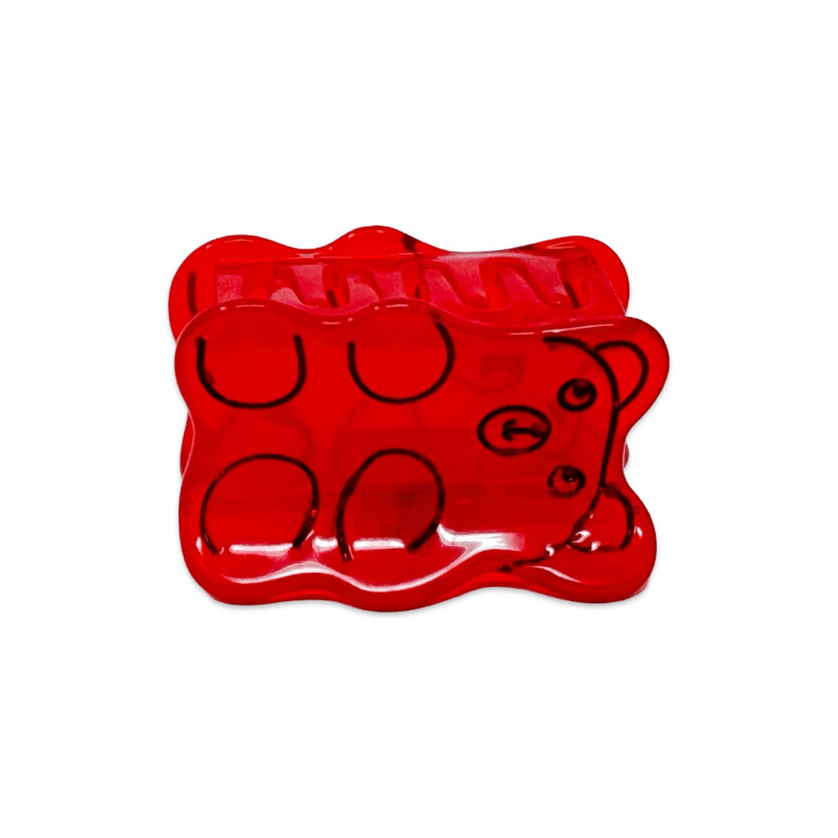 Red gummy bear-shaped mold on a white background