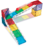 Colorful magnetic building blocks on a white background