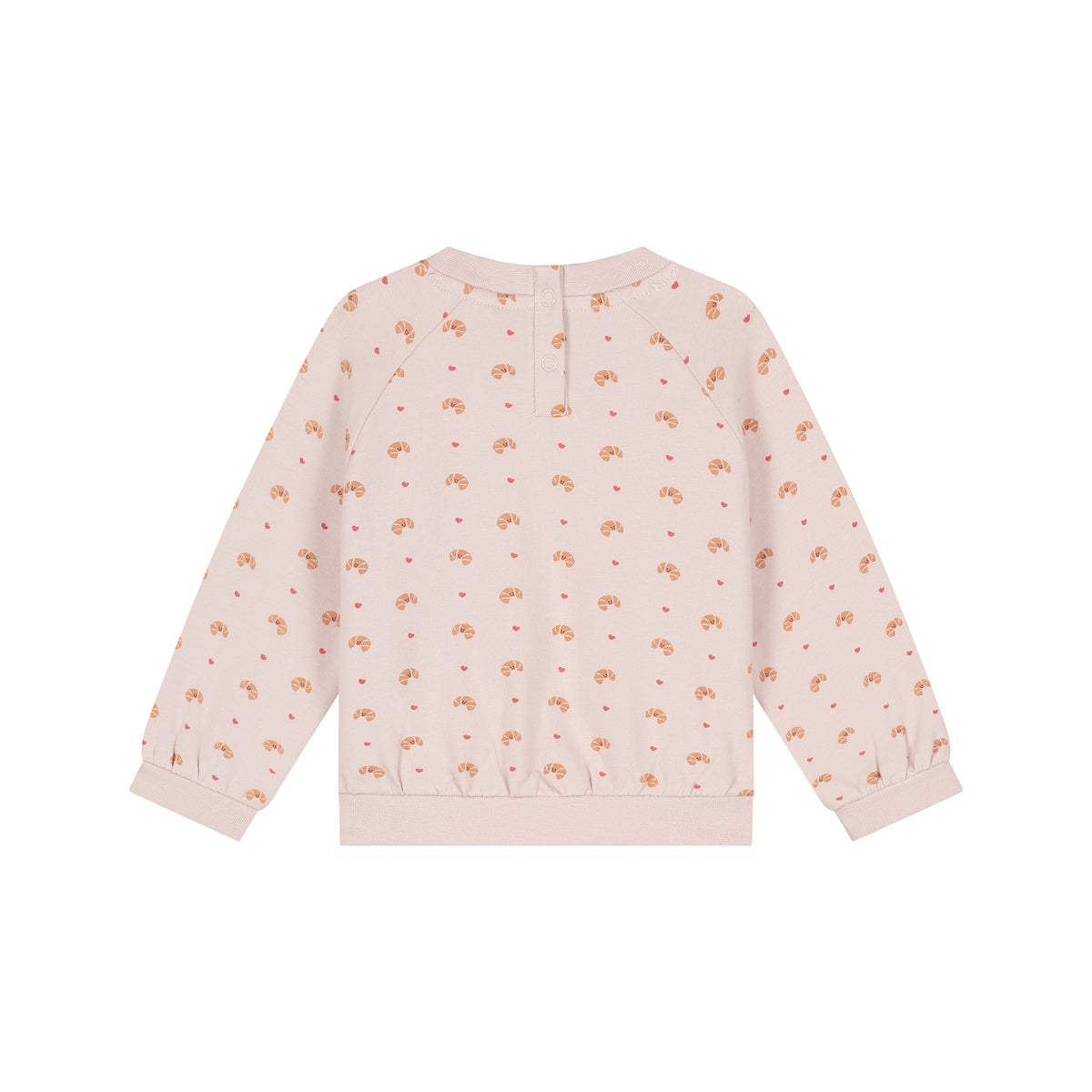 A light pink long-sleeve sweatshirt with a repeating pattern of small orange-brown rainbows and tiny red dots, shown from the back on a white background.
