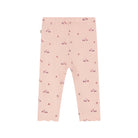 Pink toddler leggings with a small repeating pattern of tiny red cars and bows, featuring a ruffled hem.