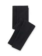 A pair of black ribbed knit leg warmers folded neatly on a clean white background.