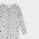 A baby long-sleeve zip-up romper in light gray ribbed fabric, featuring an all-over print of hockey pucks and sticks in brown, white, and navy blue. The brand name 'FINISK' is visible on the inner neck label.