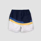 Color-blocked shorts with navy, yellow, and white on a light gray background
