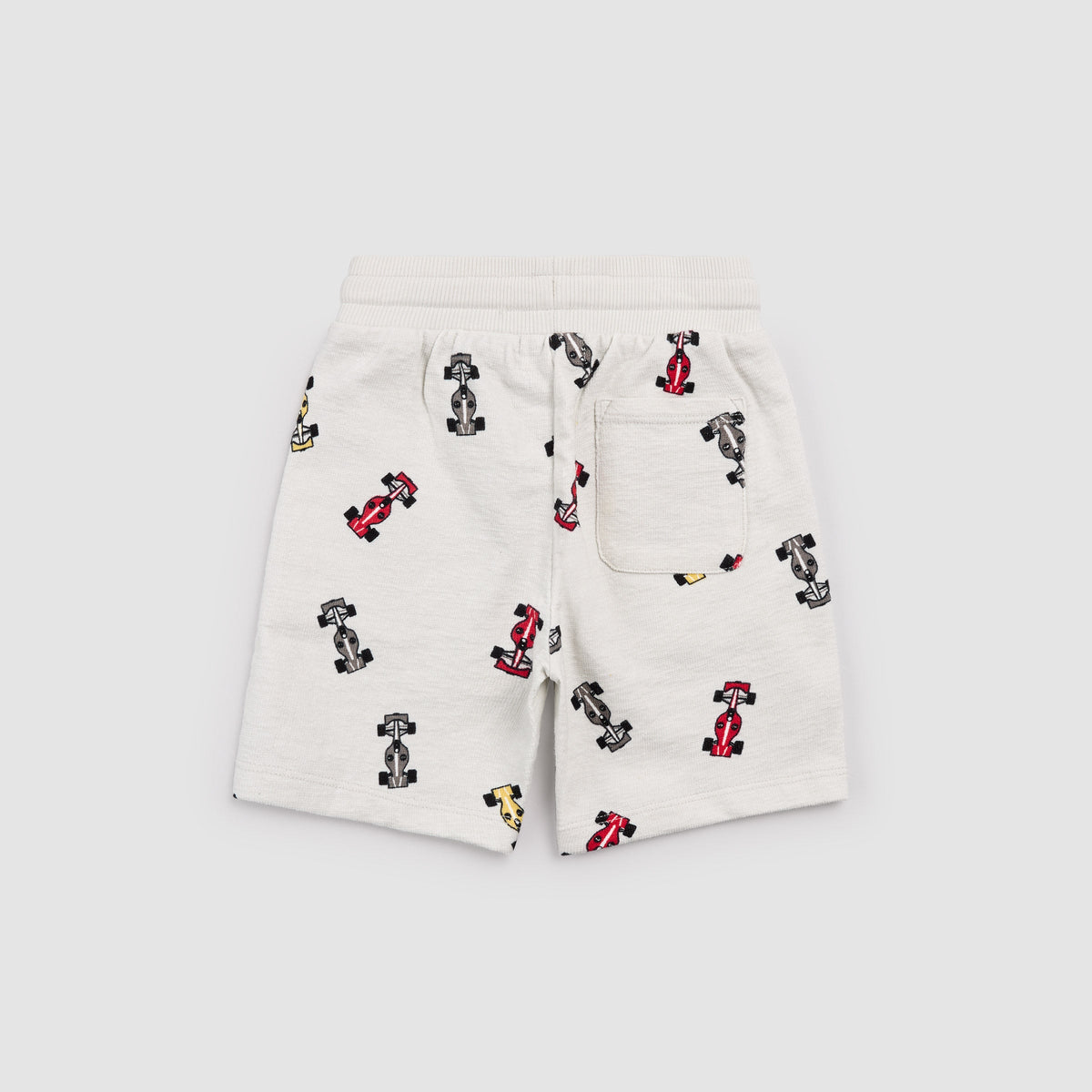 White shorts with black and red pattern on a white background
