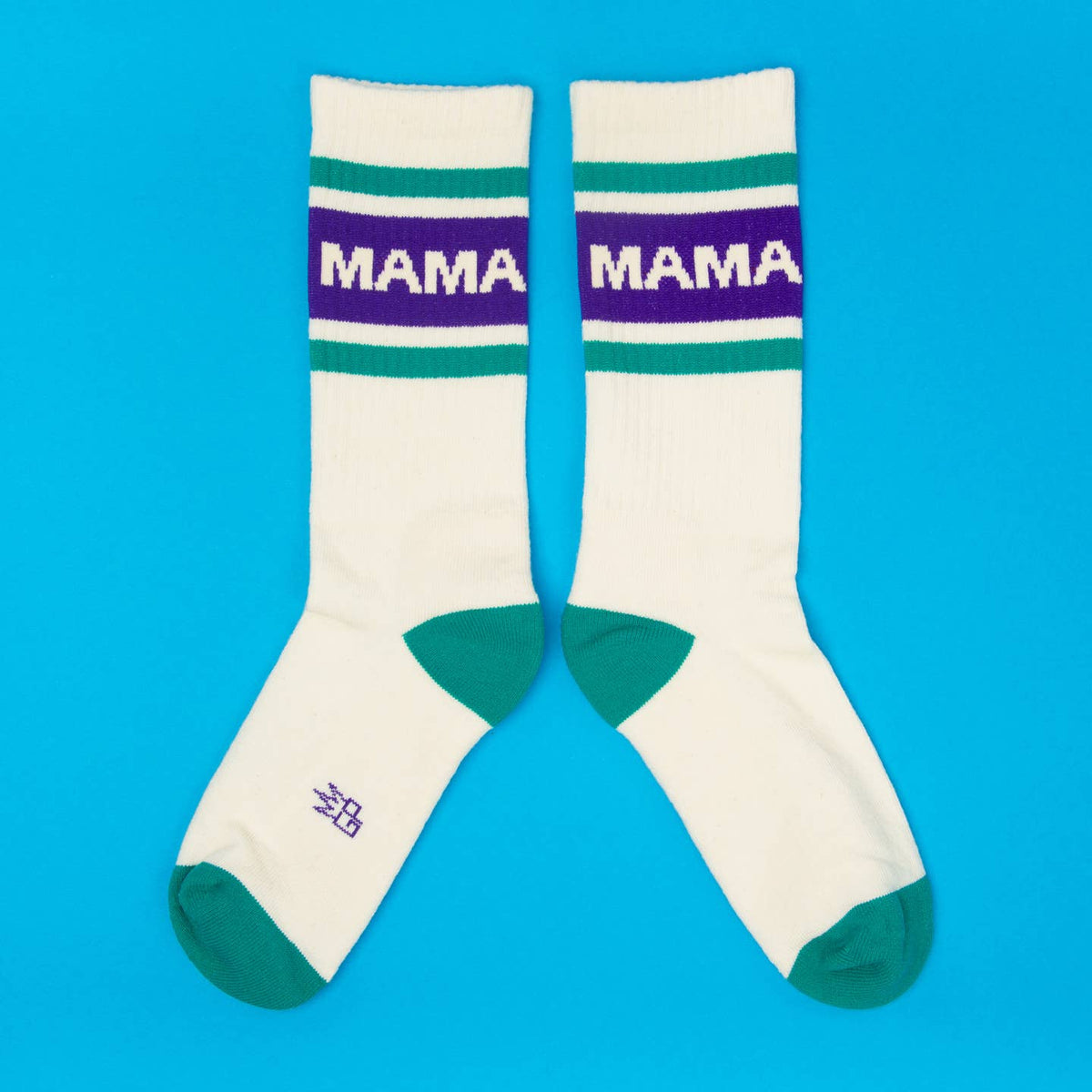 White socks with green and purple accents on a blue background