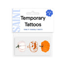 Saint brand temporary tattoo sheet set containing three pumpkin designs, packaged in a white card with blue and black text.