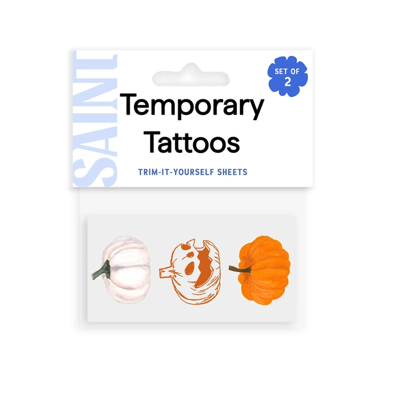 Saint brand temporary tattoo sheet set containing three pumpkin designs, packaged in a white card with blue and black text.