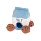 Toy resembling a milk carton with cookies on a white background