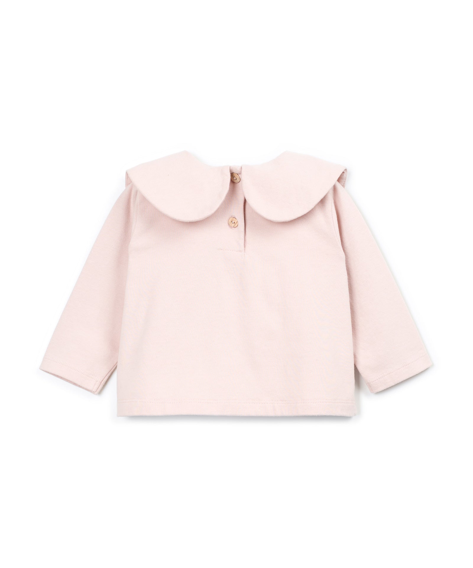 A light pink long-sleeve baby top with a large Peter Pan collar and a small gold button at the neckline, shown flat on a white background.