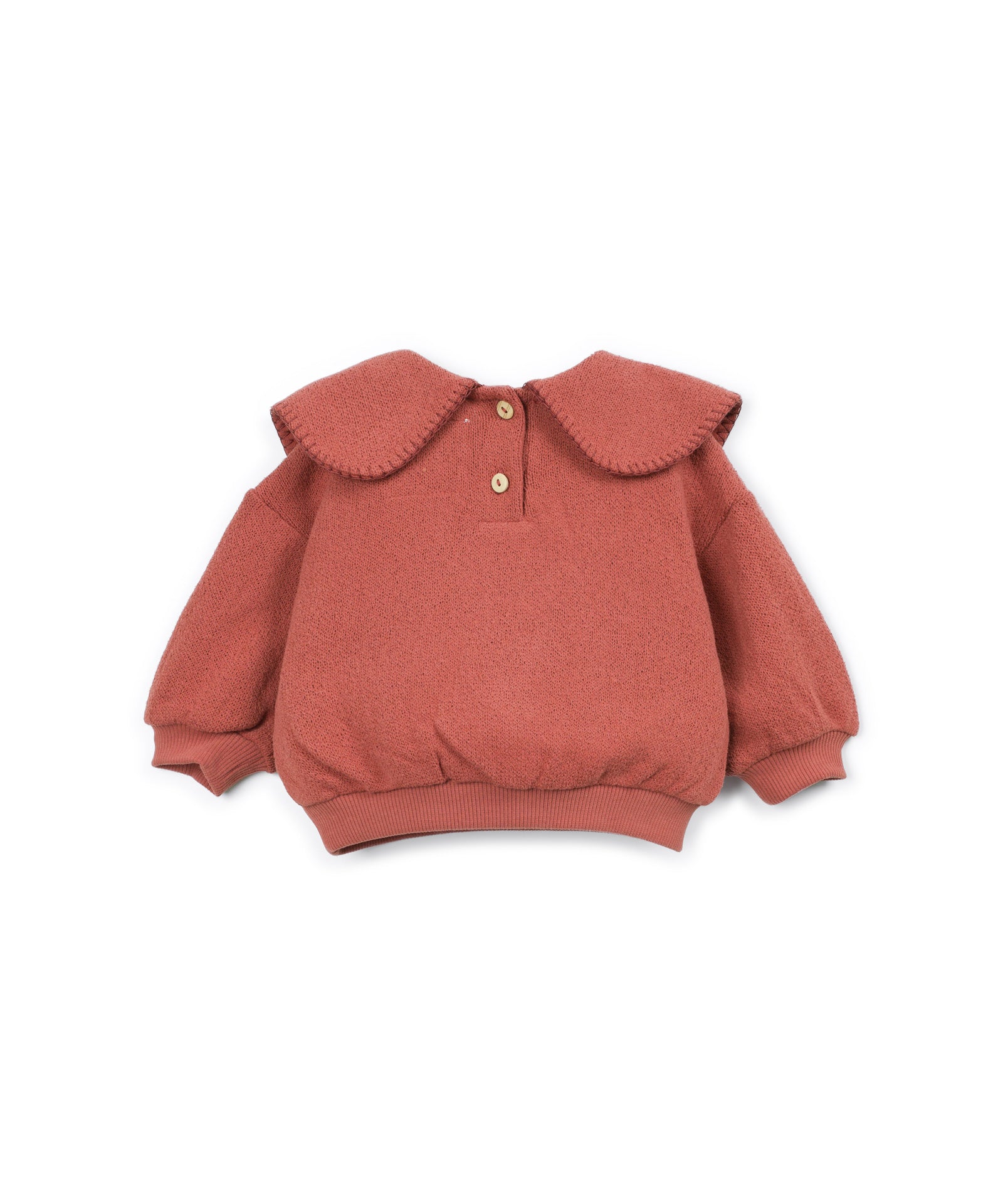 A dusty rose long-sleeve knit top for toddlers, featuring a large, wide scalloped Peter Pan collar and two small decorative buttons at the collar, displayed on a clean white background.