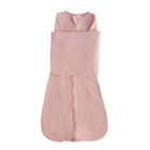 Pink baby sleeping bag on a white background