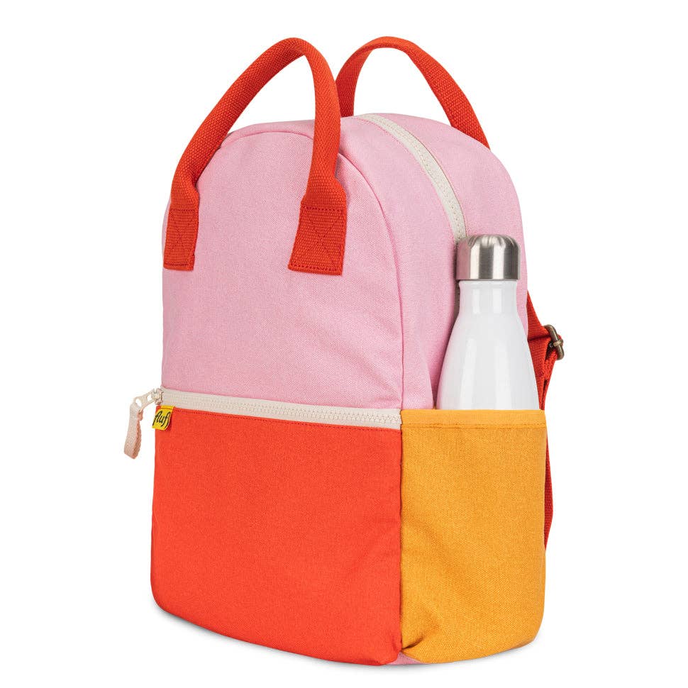 Colorful backpack with a water bottle on a white background