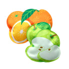 Coasters shaped like an orange, apple, and pear on a white background