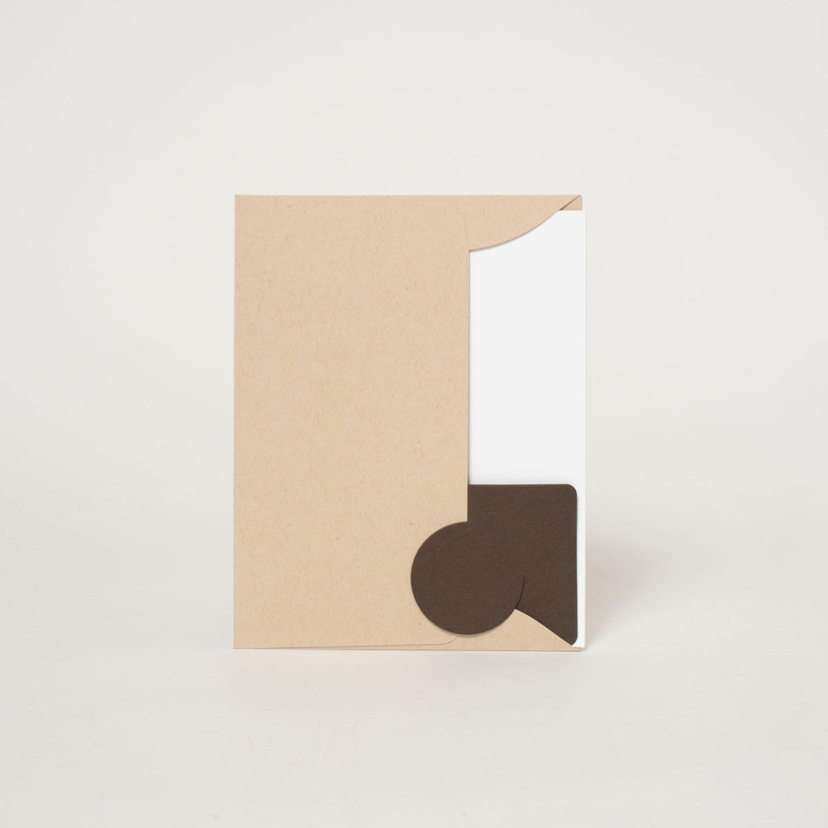 Kraft paper box with a brown heart-shaped cutout on a white background