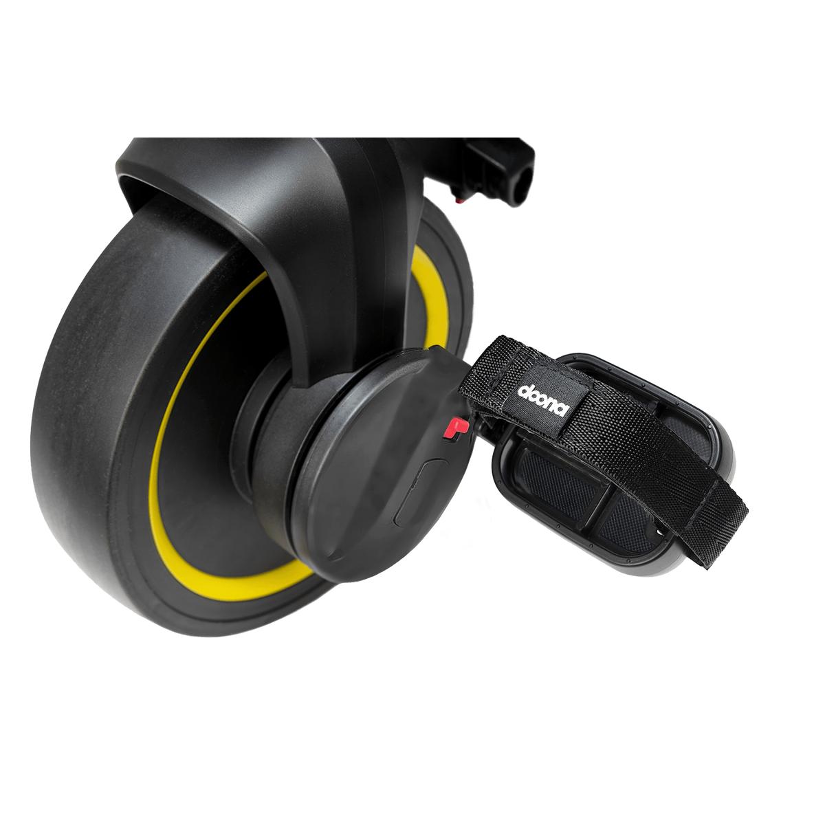 Black scooter wheel with yellow rim and strap on a white background