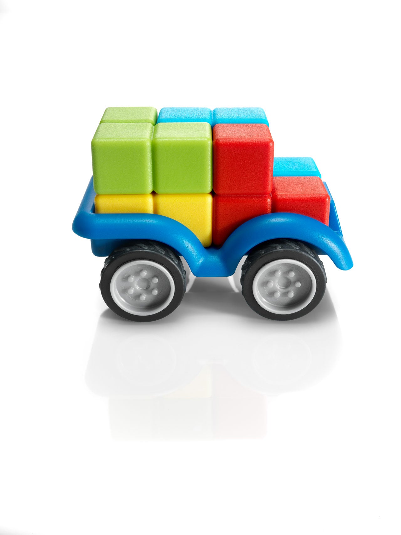 Colorful toy truck with blocks on a white background