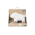 White elephant toy with brown feet in a cardboard box packaging on a white background