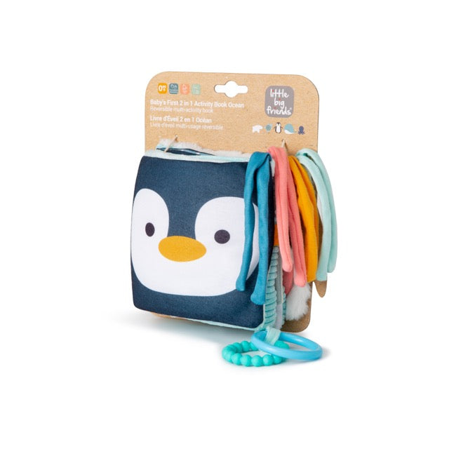 Penguin-themed baby teether set with colorful straps on a white background