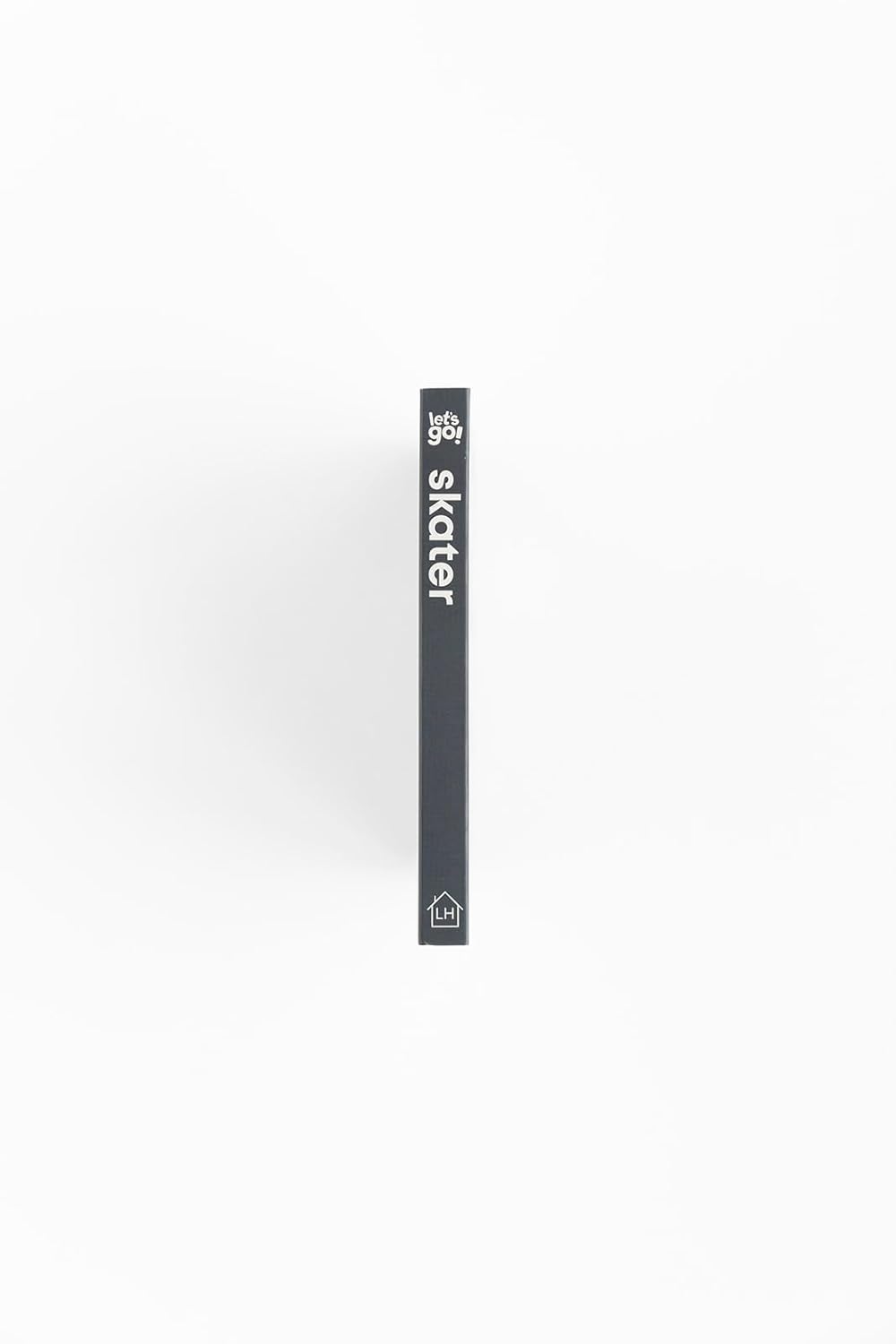 Black skateboard deck with 'skater' branding on a white background