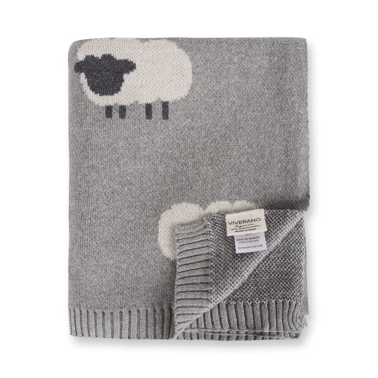Gray knitted blanket with sheep designs with Viverano label on a white background