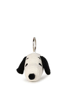 Dog-shaped keychain on a white background