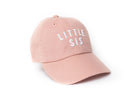 Pink cap with 'LITTLE SIS' text on a white background