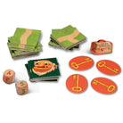 Board game components including cards, dice, and icons on a white background
