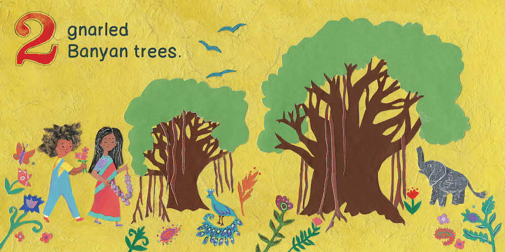 A colorful illustration from the book A Walk In The Forest showing a landscape with two children walking near gnarled banyan trees, an elephant, birds, and flowers, accompanied by the text: "2 gnarled Banyan trees."