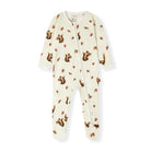 A baby footed sleeper in cream with a brown squirrel and acorn print, shown flat against a white background.