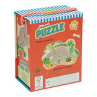 A children's wooden dinosaur puzzle in a red-orange cardboard box with a blue-and-white striped handle and multicolor printed graphics, photographed on a plain white background.