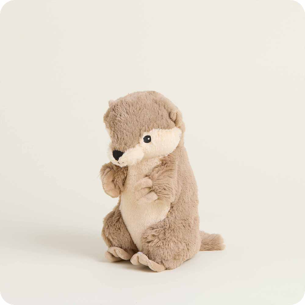 Plush toy otter on a white background