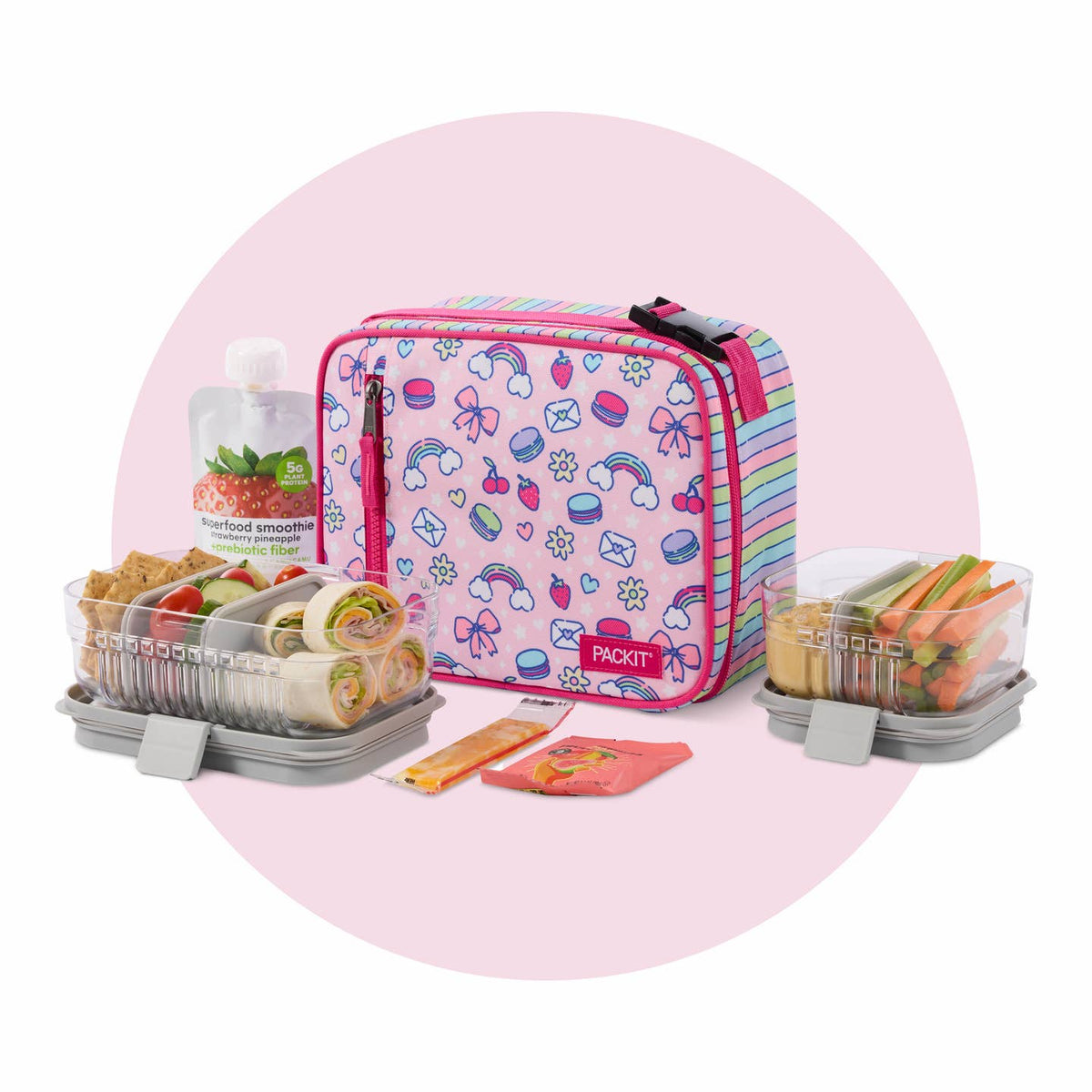 Pink lunch bag with colorful patterns and food containers on a white background