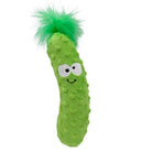 Green plush toy resembling a pickle with a smiling face on a white background