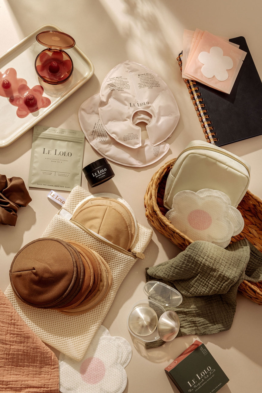 Various beauty products including face masks and containers on a light surface.